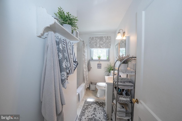 127 Long Rd, King Of Prussia, PA 19406 - bathroom featuring shower / bath combo with shower curtain and marble finish floors