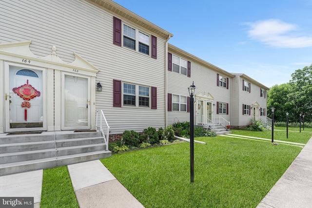 166 Center St Unit 166, Hanover, PA 17331 - view of property with entry steps and a front lawn