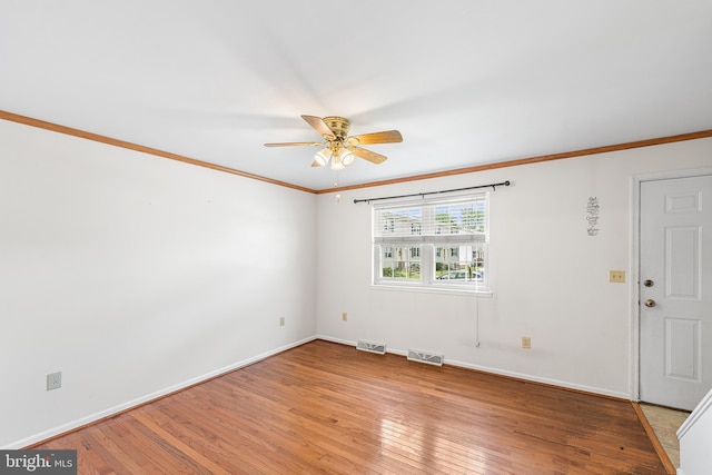 166 Center St Unit 166, Hanover, PA 17331 - unfurnished room featuring ceiling fan, light wood finished floors, and crown molding