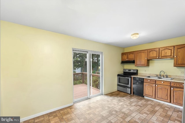 166 Center St Unit 166, Hanover, PA 17331 - kitchen featuring dishwasher, stainless steel electric range, under cabinet range hood, light countertops, and brown cabinetry