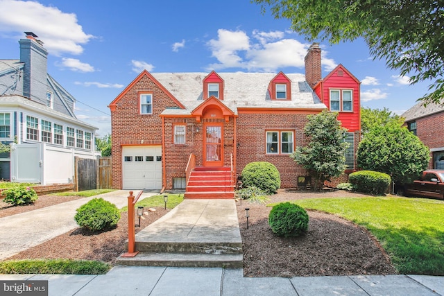 3909 17th St NE, Washington, DC 20018 - view of front of property with a garage, brick siding, a chimney, and concrete driveway