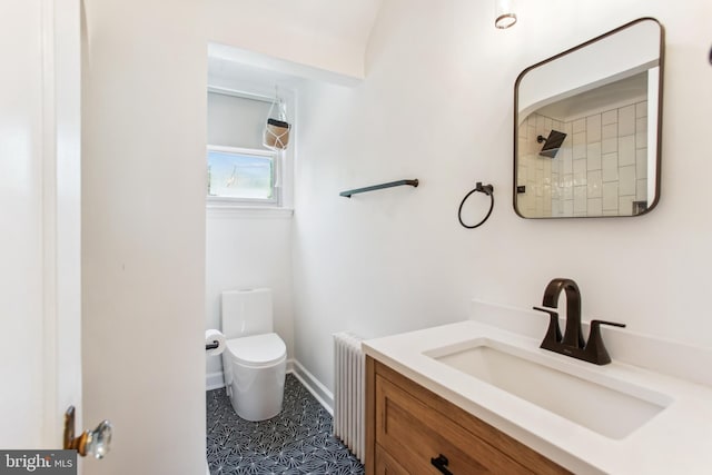 3909 17th St NE, Washington, DC 20018 - full bathroom featuring radiator heating unit, vanity, and a shower