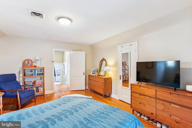 3909 17th St NE, Washington, DC 20018 - bedroom with wood finished floors and vaulted ceiling