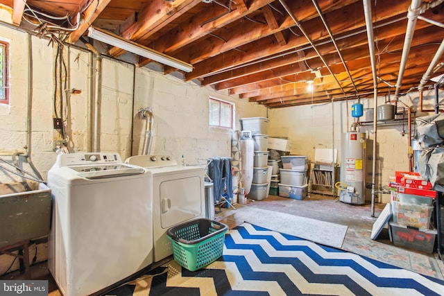 3909 17th St NE, Washington, DC 20018 - basement featuring water heater and washer and clothes dryer