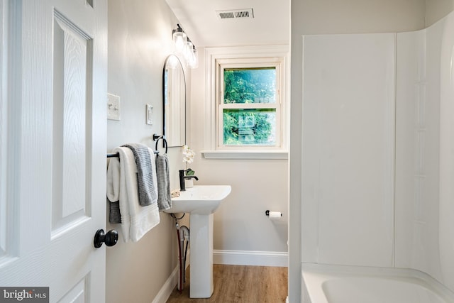 147 Meadowbrook Ave, Upper Darby, PA 19082 - full bathroom featuring wood finished floors and bathing tub / shower combination
