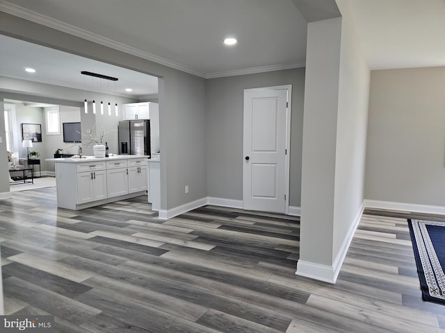 2900 Westfield Ave, Baltimore, MD 21214 - kitchen featuring stainless steel fridge with ice dispenser, open floor plan, white cabinetry, wood finished floors, and recessed lighting