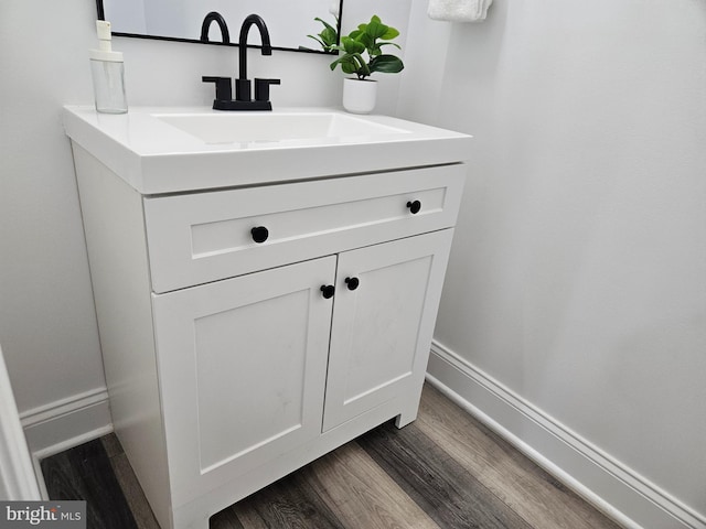 2900 Westfield Ave, Baltimore, MD 21214 - bathroom with wood finished floors and vanity