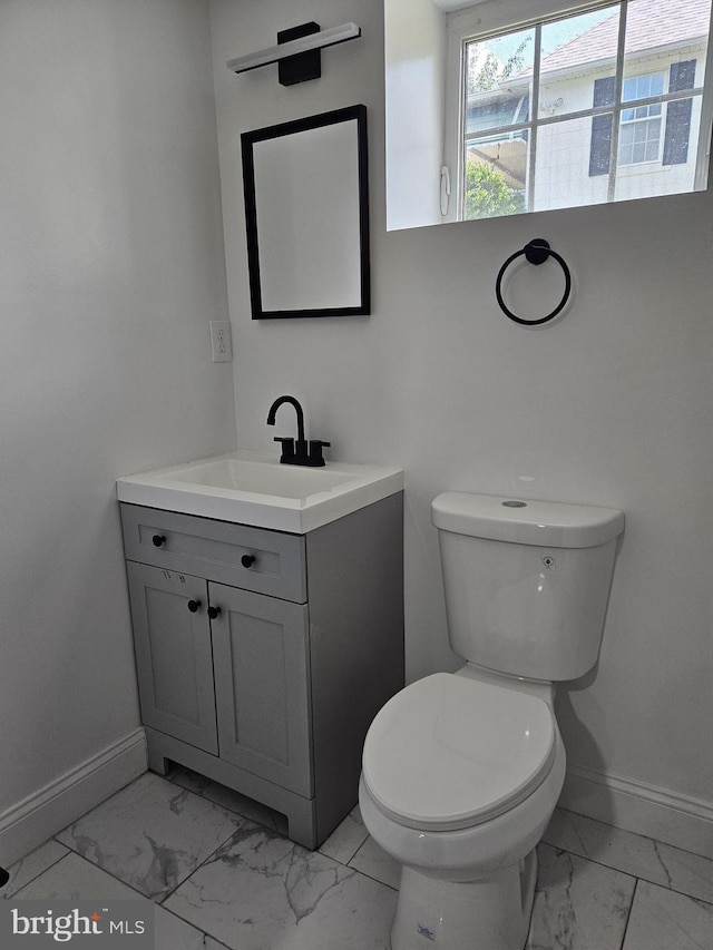 2900 Westfield Ave, Baltimore, MD 21214 - half bath featuring marble look tiles and vanity