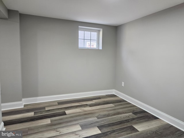 2900 Westfield Ave, Baltimore, MD 21214 - empty room with baseboards and dark wood-type flooring