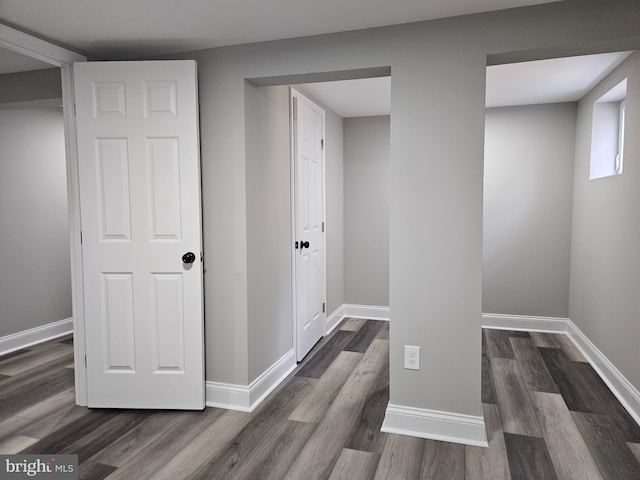 2900 Westfield Ave, Baltimore, MD 21214 - below grade area featuring dark wood-type flooring and baseboards