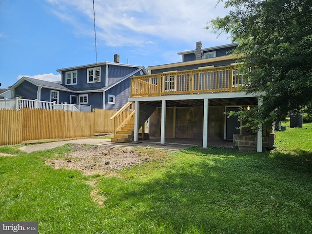 2900 Westfield Ave, Baltimore, MD 21214 - back of property featuring a wooden deck and stairs