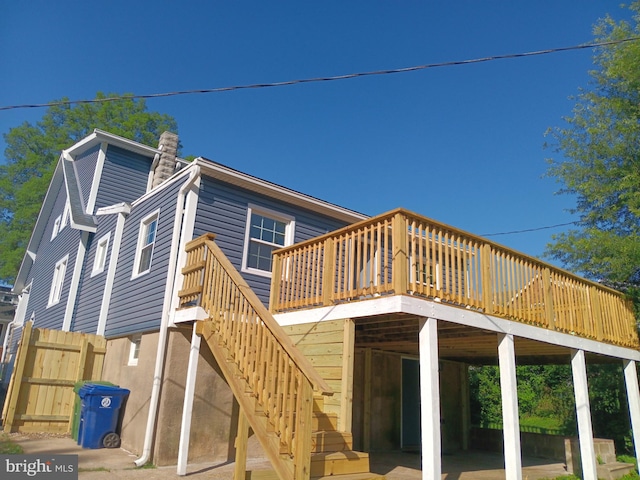 2900 Westfield Ave, Baltimore, MD 21214 - rear view of house featuring a wooden deck and stairs