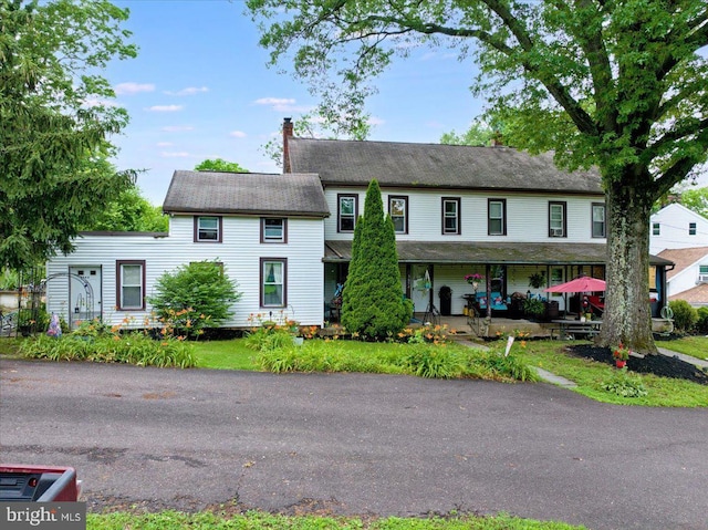 3854-3856 Schuylkill Rd, Spring City, PA 19475 - townhome / multi-family property featuring covered porch and a chimney