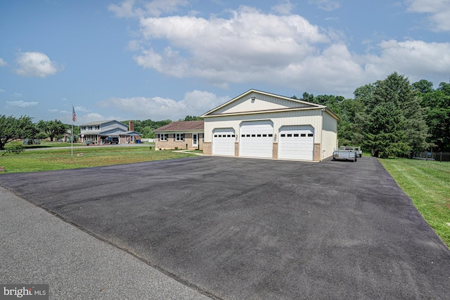 121 Pine Valley Dr, Middletown, DE 19709 - view of front of property featuring a garage and a front lawn