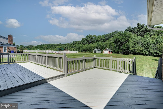 121 Pine Valley Dr, Middletown, DE 19709 - wooden deck with a lawn and a storage shed