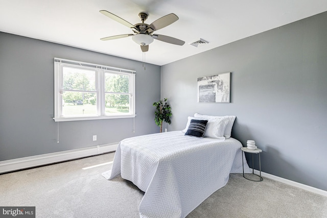121 Pine Valley Dr, Middletown, DE 19709 - carpeted bedroom featuring a baseboard heating unit and a ceiling fan