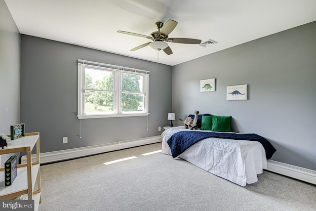 121 Pine Valley Dr, Middletown, DE 19709 - carpeted bedroom with a baseboard radiator, a ceiling fan, and a baseboard heating unit