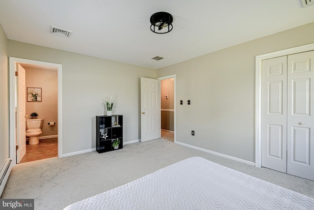 121 Pine Valley Dr, Middletown, DE 19709 - bedroom featuring carpet, a closet, ensuite bath, and a baseboard heating unit
