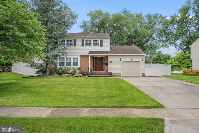 3007 Concord Dr, Cinnaminson, NJ 08077 - view of front facade with an attached garage, driveway, brick siding, and roof with shingles