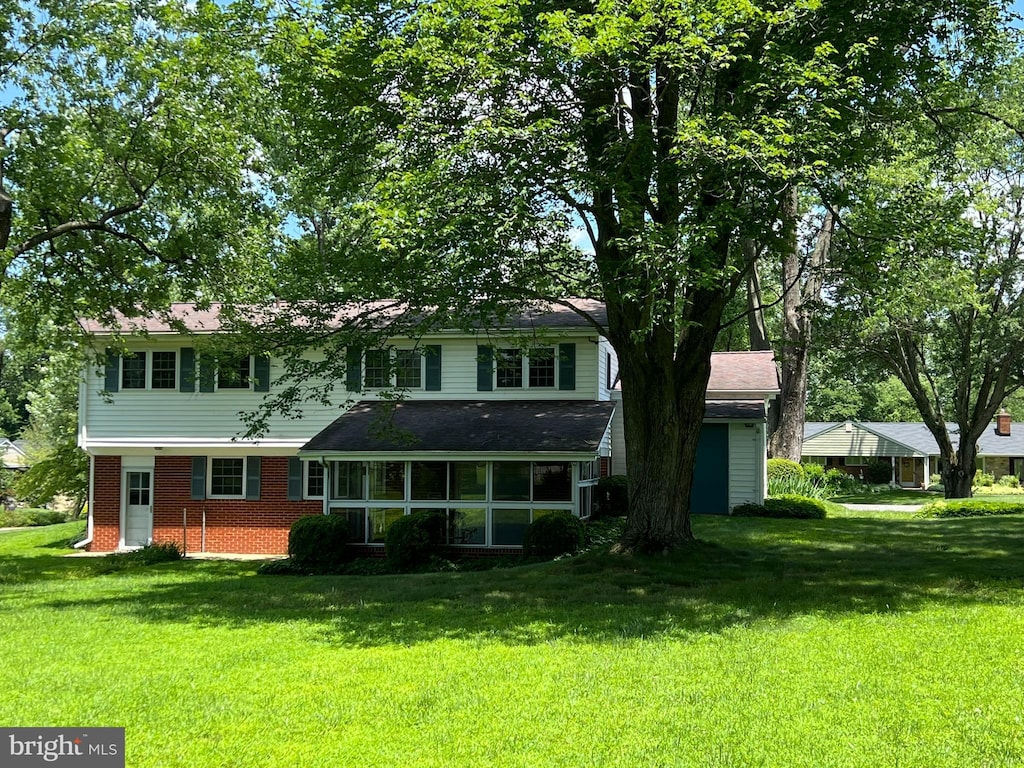 6430 Amherst Ave, Columbia, MD 21046 - back of property with a yard and brick siding