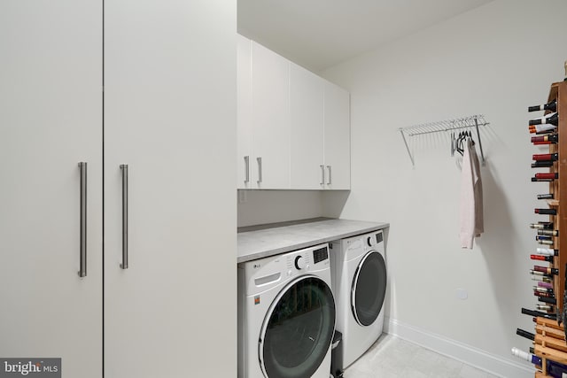 401 Bold Ruler Ct Unit 403, Havre De Grace, MD 21078 - laundry area with washing machine and dryer and cabinet space