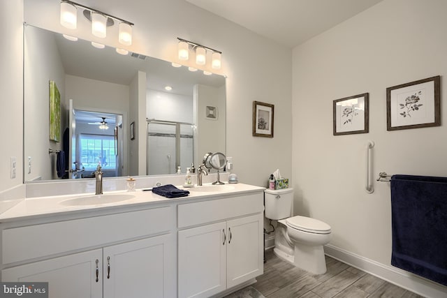 401 Bold Ruler Ct Unit 403, Havre De Grace, MD 21078 - bathroom featuring double vanity, a shower stall, and wood finished floors