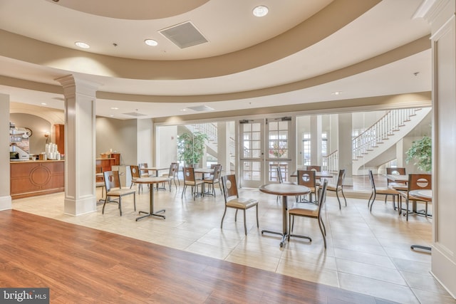 401 Bold Ruler Ct Unit 403, Havre De Grace, MD 21078 - dining room with ornate columns, healthy amount of natural light, recessed lighting, and light wood-type flooring