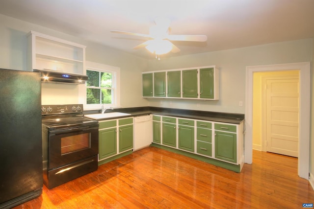 618 S 1st St, Charlottesville, VA 22902 - kitchen with green cabinetry, black appliances, under cabinet range hood, ceiling fan, and wood finished floors