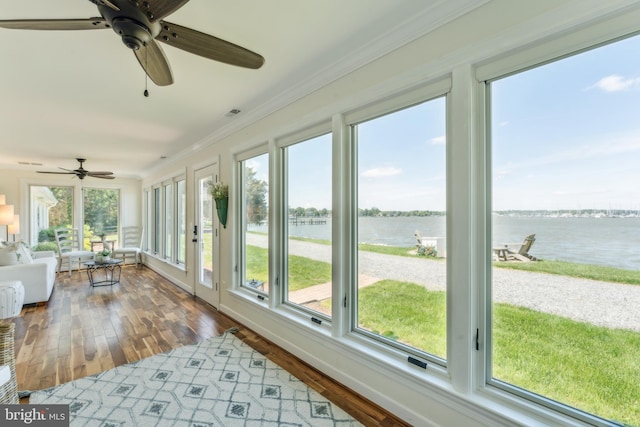 1045 Back Bay Beach Rd, West River, MD 20778 - sunroom featuring a water view, healthy amount of natural light, hardwood / wood-style flooring, and crown molding