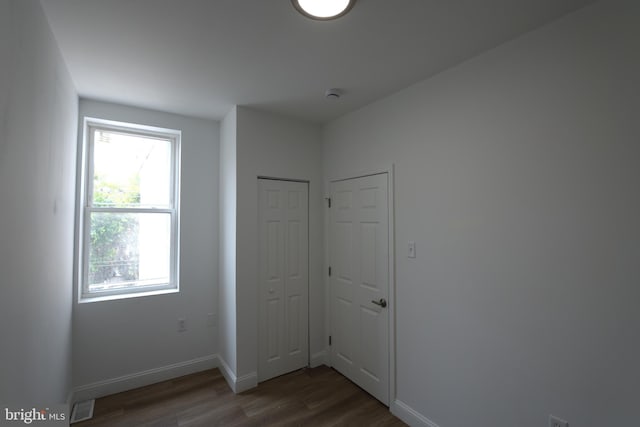 2420 N Reese St, Philadelphia, PA 19133 - empty room featuring wood finished floors and a smoke detector