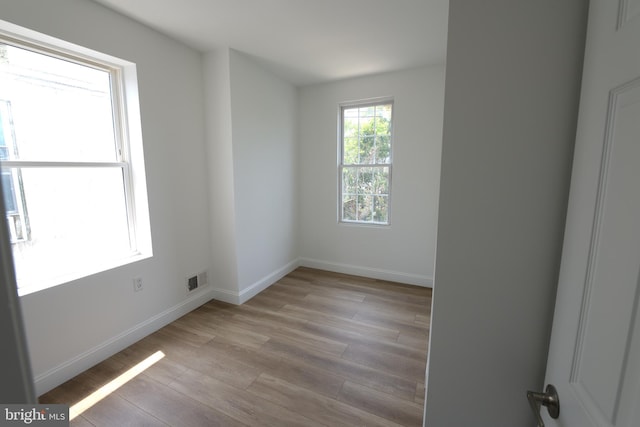 2420 N Reese St, Philadelphia, PA 19133 - unfurnished room with wood finished floors and baseboards