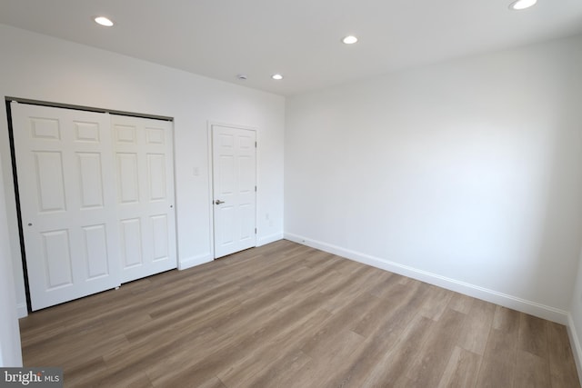 2420 N Reese St, Philadelphia, PA 19133 - unfurnished bedroom with light wood-style flooring, recessed lighting, and a closet