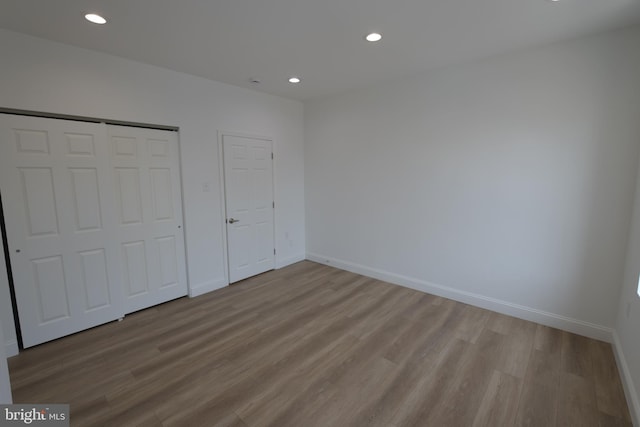 2420 N Reese St, Philadelphia, PA 19133 - unfurnished bedroom featuring wood finished floors, recessed lighting, and a closet
