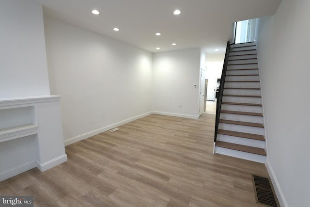 2420 N Reese St, Philadelphia, PA 19133 - basement featuring stairs, recessed lighting, and light wood-type flooring
