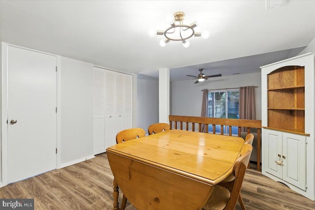 1348 Hazel Nut Ct, Annapolis, MD 21409 - dining space with wood finished floors and a chandelier