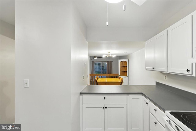 1348 Hazel Nut Ct, Annapolis, MD 21409 - kitchen with a ceiling fan, white cabinetry, and dark countertops