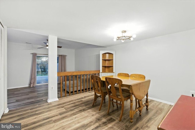 1348 Hazel Nut Ct, Annapolis, MD 21409 - dining space with wood finished floors, a chandelier, and ceiling fan