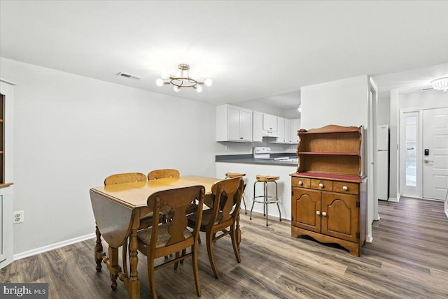 1348 Hazel Nut Ct, Annapolis, MD 21409 - dining room featuring a chandelier and wood finished floors