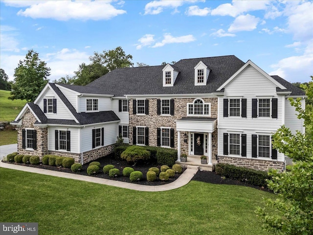 203 Geist View Cir, Media, PA 19063 - view of front of home with stone siding, a front lawn, and a shingled roof