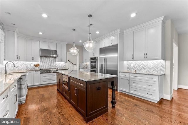 203 Geist View Cir, Media, PA 19063 - kitchen with built in appliances, backsplash, white cabinets, and recessed lighting
