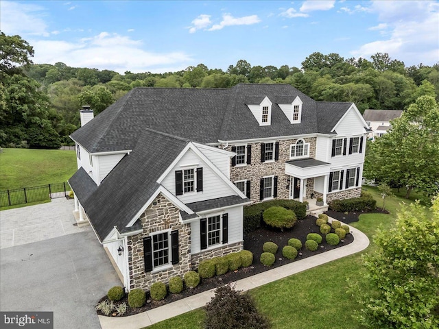 203 Geist View Cir, Media, PA 19063 - view of front of home featuring stone siding, a chimney, and a shingled roof