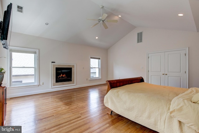 1829 47th Pl NW, Washington, DC 20007 - bedroom featuring wood finished floors, a glass covered fireplace, high vaulted ceiling, recessed lighting, and ceiling fan