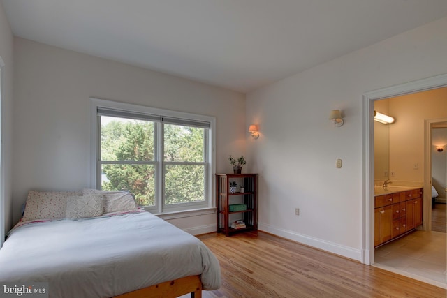 1829 47th Pl NW, Washington, DC 20007 - bedroom featuring light wood-type flooring and ensuite bathroom