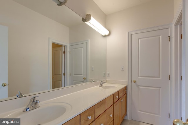 1829 47th Pl NW, Washington, DC 20007 - bathroom with double vanity and tile patterned floors