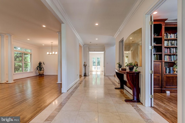 1829 47th Pl NW, Washington, DC 20007 - corridor featuring plenty of natural light, a chandelier, recessed lighting, crown molding, and inlaid floor details
