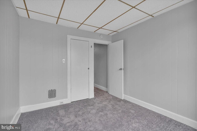 521 Bergen St, Gloucester City, NJ 08030 - carpeted empty room with a drop ceiling
