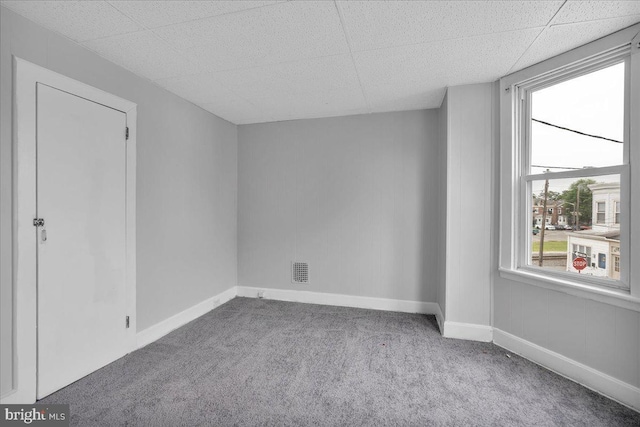 521 Bergen St, Gloucester City, NJ 08030 - unfurnished room with carpet flooring, healthy amount of natural light, and a paneled ceiling