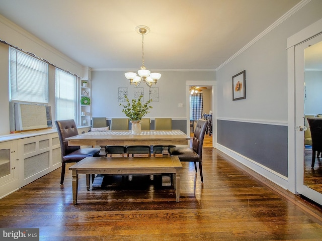 121 Wayne Ave, Springfield, PA 19064 - dining space with a chandelier, dark wood-style flooring, and ornamental molding
