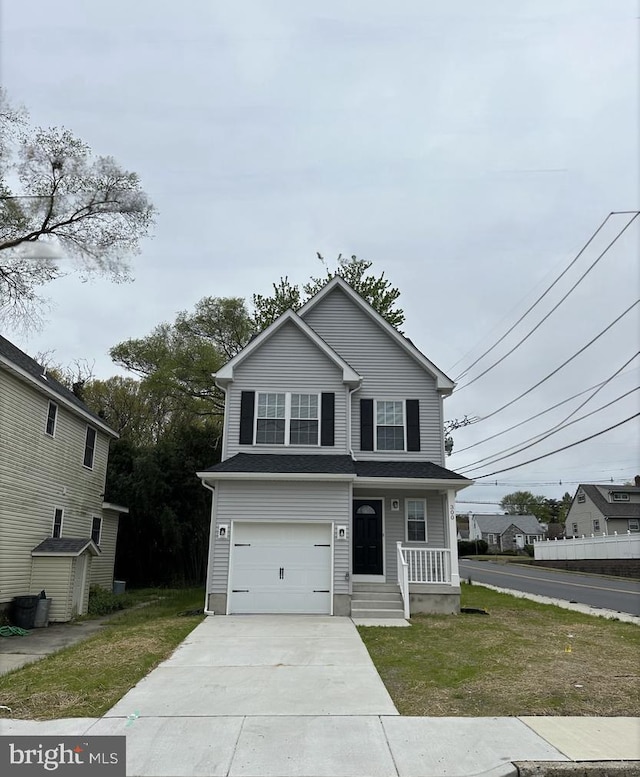 300 Saunders Ave, Bellmawr, NJ 08031 - view of front of house with covered porch, a garage, a front lawn, and concrete driveway