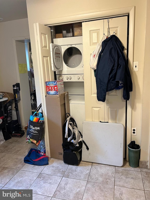 1220 Pine St, Philadelphia, PA 19107 - washroom featuring estacked washer and dryer and tile patterned floors